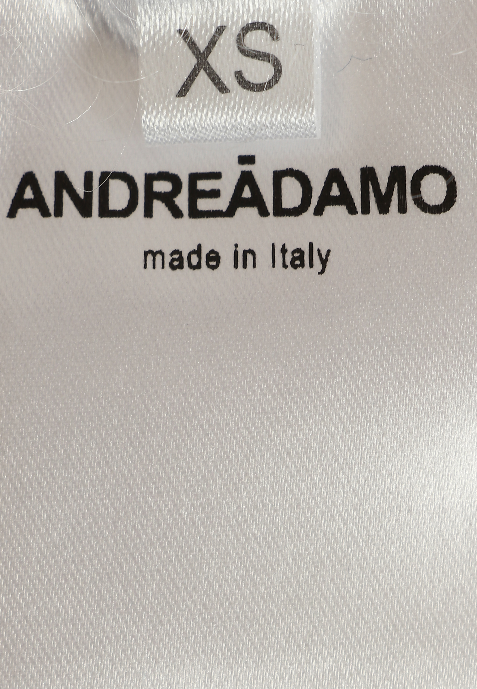 Объёмный свитер с разрезом  ANDREADAMO
